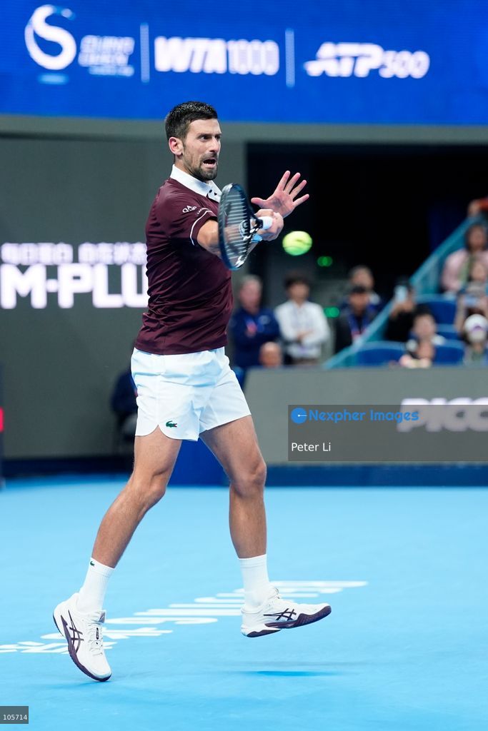 Novak Djokovic of Serbia in action against Alex De Minaur of Australia during their Men's Singles final match on day seven of China Open at the National Tennis Center on October 6, 2026 in Beijing, China. (Photo by Peter Li/Nexpher Images)