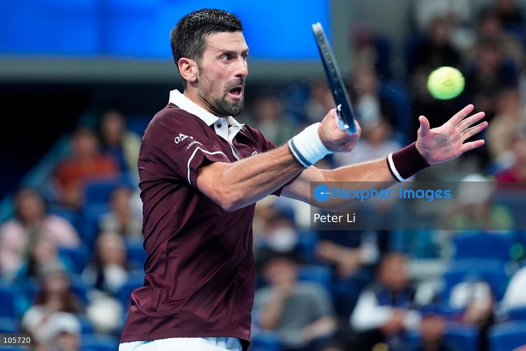 Novak Djokovic of Serbia in action against Alex De Minaur of Australia during their Men's Singles final match on day seven of China Open at the National Tennis Center on October 6, 2026 in Beijing, China. (Photo by Peter Li/Nexpher Images)
