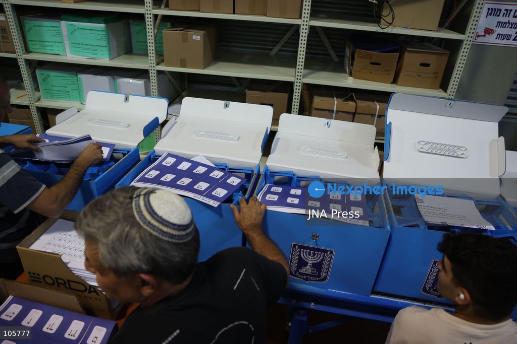 SHOHAM, ISRAEL, OCTOBER 14, 2026: Preparations for Israel’s upcoming parliamentary elections at the Central Elections Committee’s logistics centre in Shoham. Workers organise and pack voting materials and polling station equipment during a media tour of the facility. Photo by Saeed qaq / JNA PREES (Photo by Saeed Qaq/JNA Press via Nexpher Images)