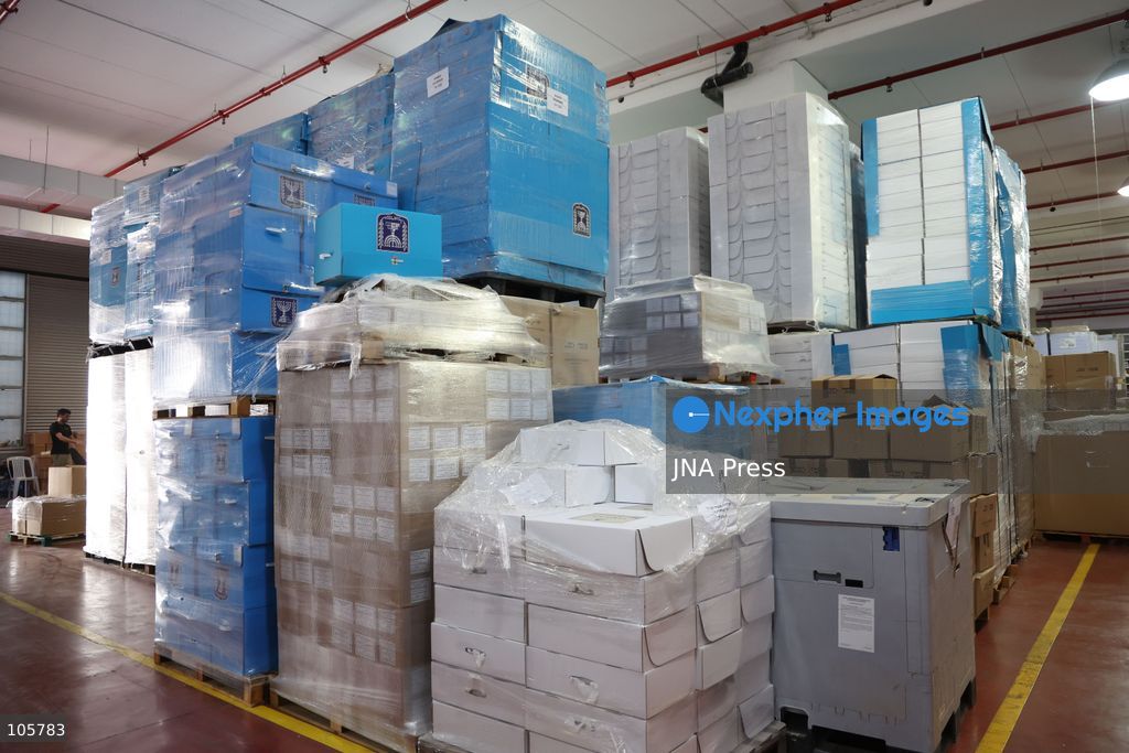 SHOHAM, ISRAEL, OCTOBER 14, 2026: Preparations for Israel’s upcoming parliamentary elections at the Central Elections Committee’s logistics centre in Shoham. Workers organise and pack voting materials and polling station equipment during a media tour of the facility. Photo by Saeed qaq / JNA PREES (Photo by Saeed Qaq/JNA Press via Nexpher Images)