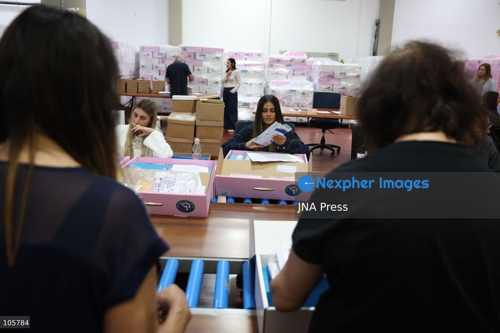 SHOHAM, ISRAEL, OCTOBER 14, 2026: Preparations for Israel’s upcoming parliamentary elections at the Central Elections Committee’s logistics centre in Shoham. Workers organise and pack voting materials and polling station equipment during a media tour of the facility. Photo by Saeed qaq / JNA PREES (Photo by Saeed Qaq/JNA Press via Nexpher Images)