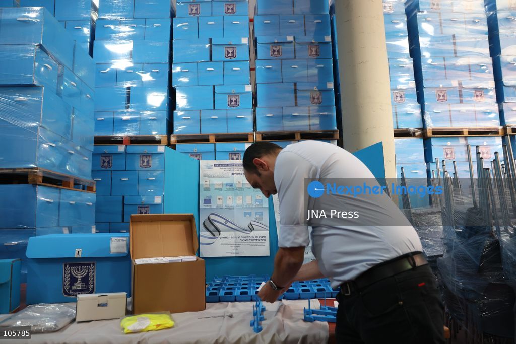 SHOHAM, ISRAEL, OCTOBER 14, 2026: Preparations for Israel’s upcoming parliamentary elections at the Central Elections Committee’s logistics centre in Shoham. Workers organise and pack voting materials and polling station equipment during a media tour of the facility. Photo by Saeed qaq / JNA PREES (Photo by Saeed Qaq/JNA Press via Nexpher Images)