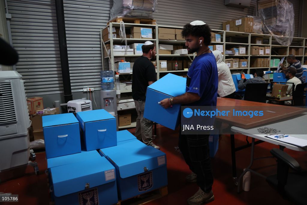 SHOHAM, ISRAEL, OCTOBER 14, 2026: Preparations for Israel’s upcoming parliamentary elections at the Central Elections Committee’s logistics centre in Shoham. Workers organise and pack voting materials and polling station equipment during a media tour of the facility. Photo by Saeed qaq / JNA PREES (Photo by Saeed Qaq/JNA Press via Nexpher Images)