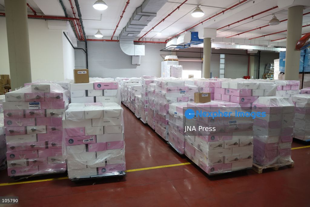 SHOHAM, ISRAEL, OCTOBER 14, 2026: Preparations for Israel’s upcoming parliamentary elections at the Central Elections Committee’s logistics centre in Shoham. Workers organise and pack voting materials and polling station equipment during a media tour of the facility. Photo by Saeed qaq / JNA PREES (Photo by Saeed Qaq/JNA Press via Nexpher Images)