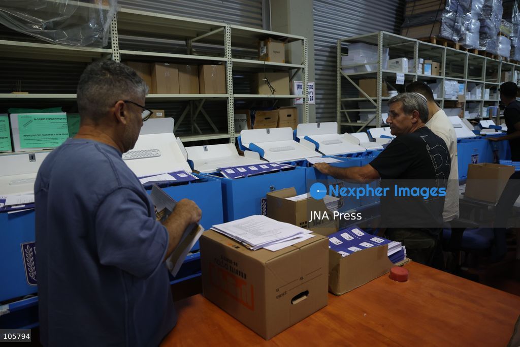 SHOHAM, ISRAEL, OCTOBER 14, 2026: Preparations for Israel’s upcoming parliamentary elections at the Central Elections Committee’s logistics centre in Shoham. Workers organise and pack voting materials and polling station equipment during a media tour of the facility. Photo by Saeed qaq / JNA PREES (Photo by Saeed Qaq/JNA Press via Nexpher Images)