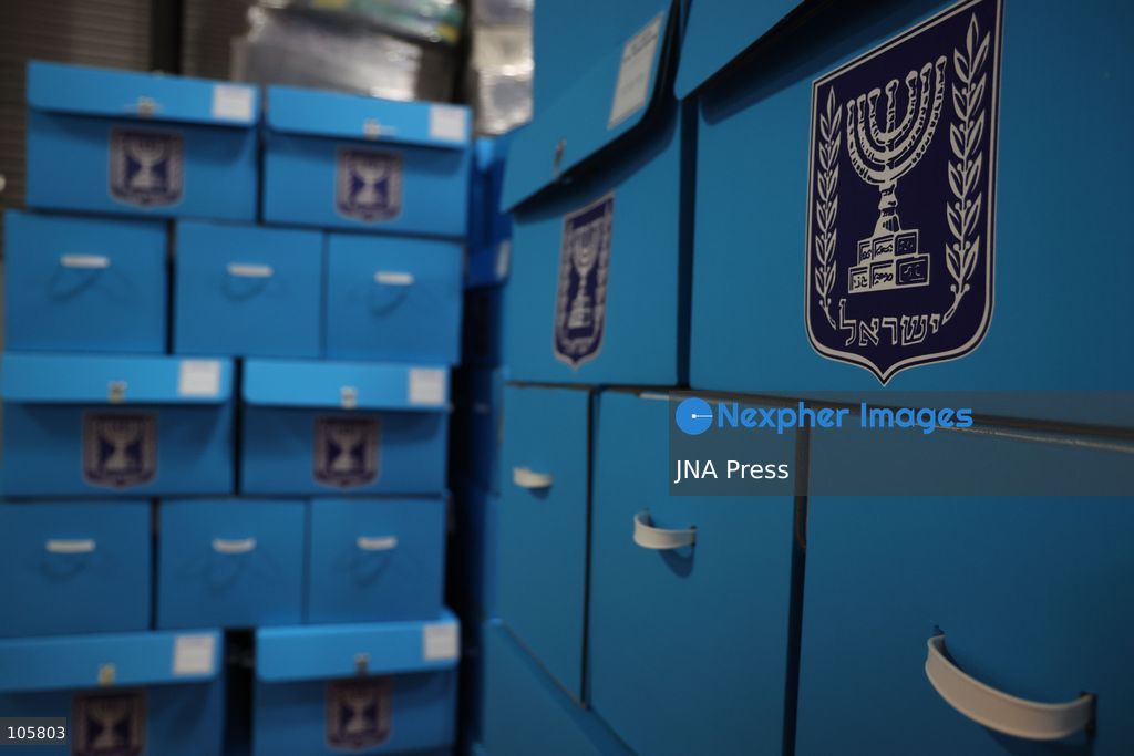 SHOHAM, ISRAEL, OCTOBER 14, 2026: Preparations for Israel’s upcoming parliamentary elections at the Central Elections Committee’s logistics centre in Shoham. Workers organise and pack voting materials and polling station equipment during a media tour of the facility. Photo by Saeed qaq / JNA PREES (Photo by Saeed Qaq/JNA Press via Nexpher Images)