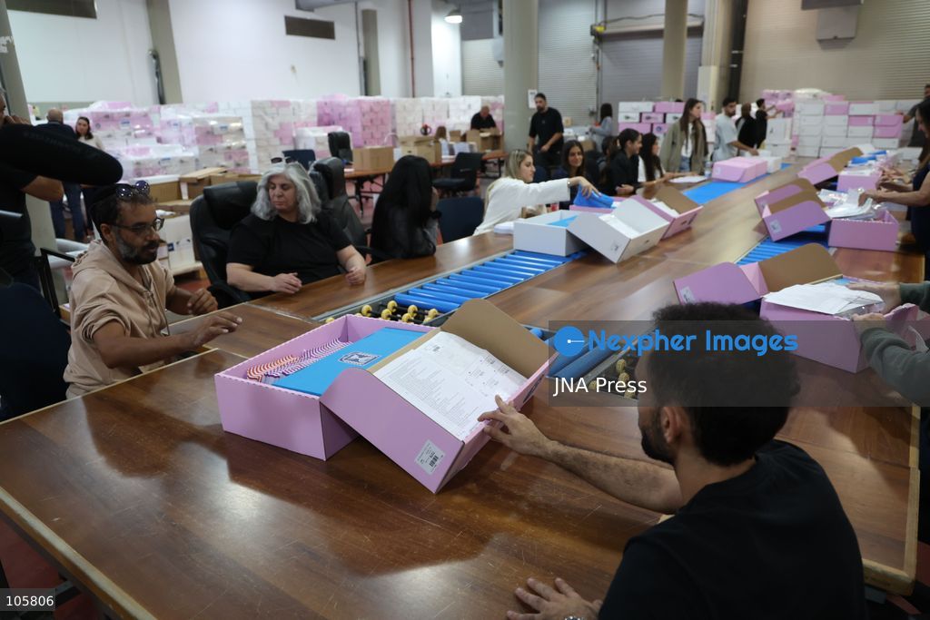 SHOHAM, ISRAEL, OCTOBER 14, 2026: Preparations for Israel’s upcoming parliamentary elections at the Central Elections Committee’s logistics centre in Shoham. Workers organise and pack voting materials and polling station equipment during a media tour of the facility. Photo by Saeed qaq / JNA PREES (Photo by Saeed Qaq/JNA Press via Nexpher Images)