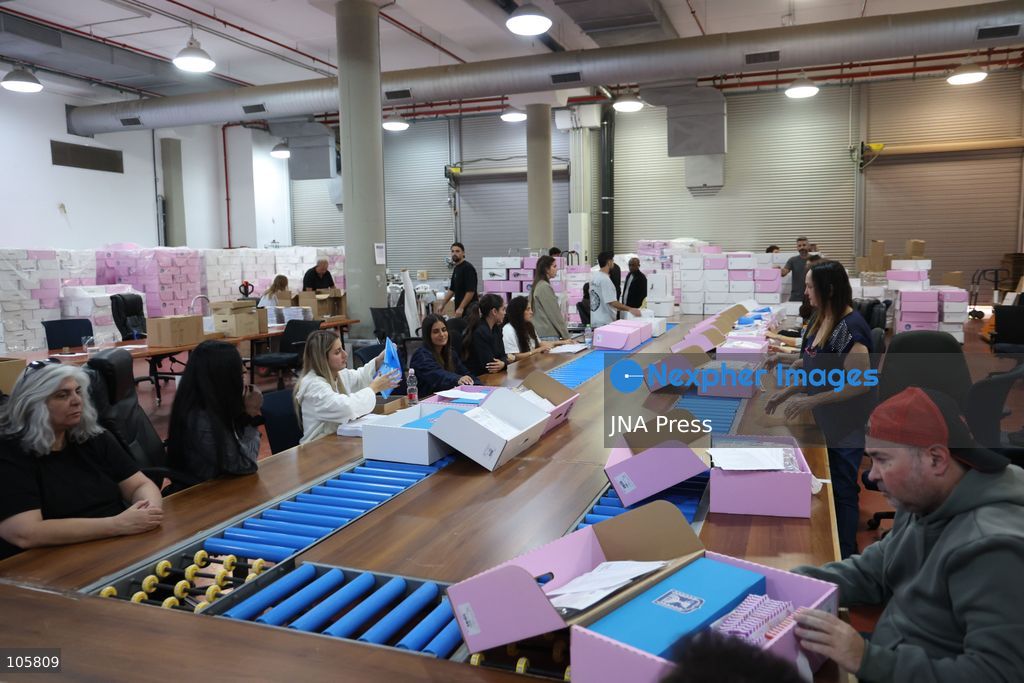 SHOHAM, ISRAEL, OCTOBER 14, 2026: Preparations for Israel’s upcoming parliamentary elections at the Central Elections Committee’s logistics centre in Shoham. Workers organise and pack voting materials and polling station equipment during a media tour of the facility. Photo by Saeed qaq / JNA PREES (Photo by Saeed Qaq/JNA Press via Nexpher Images)