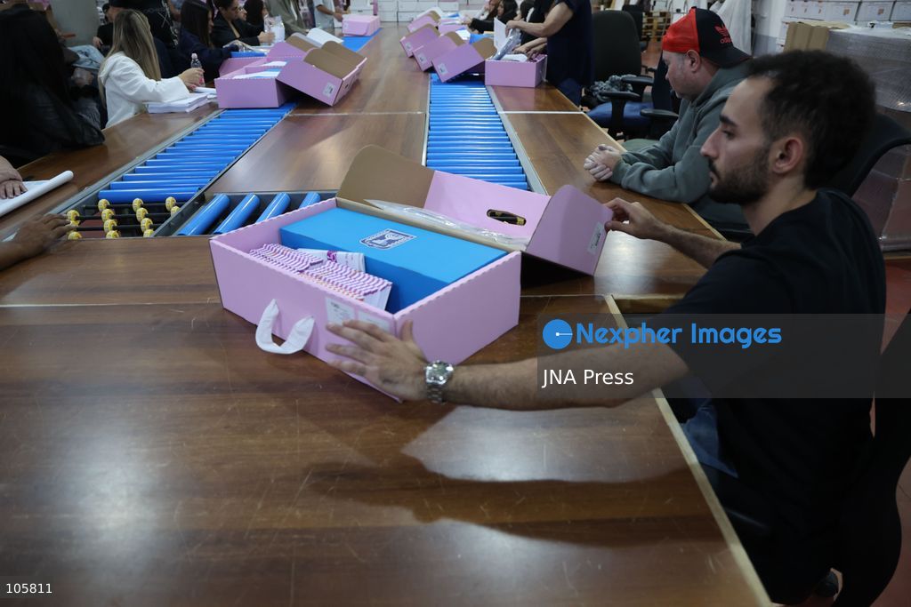 SHOHAM, ISRAEL, OCTOBER 14, 2026: Preparations for Israel’s upcoming parliamentary elections at the Central Elections Committee’s logistics centre in Shoham. Workers organise and pack voting materials and polling station equipment during a media tour of the facility. Photo by Saeed qaq / JNA PREES (Photo by Saeed Qaq/JNA Press via Nexpher Images)