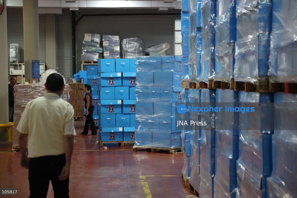 SHOHAM, ISRAEL, OCTOBER 14, 2026: Preparations for Israel’s upcoming parliamentary elections at the Central Elections Committee’s logistics centre in Shoham. Workers organise and pack voting materials and polling station equipment during a media tour of the facility. Photo by Saeed qaq / JNA PREES (Photo by Saeed Qaq/JNA Press via Nexpher Images)