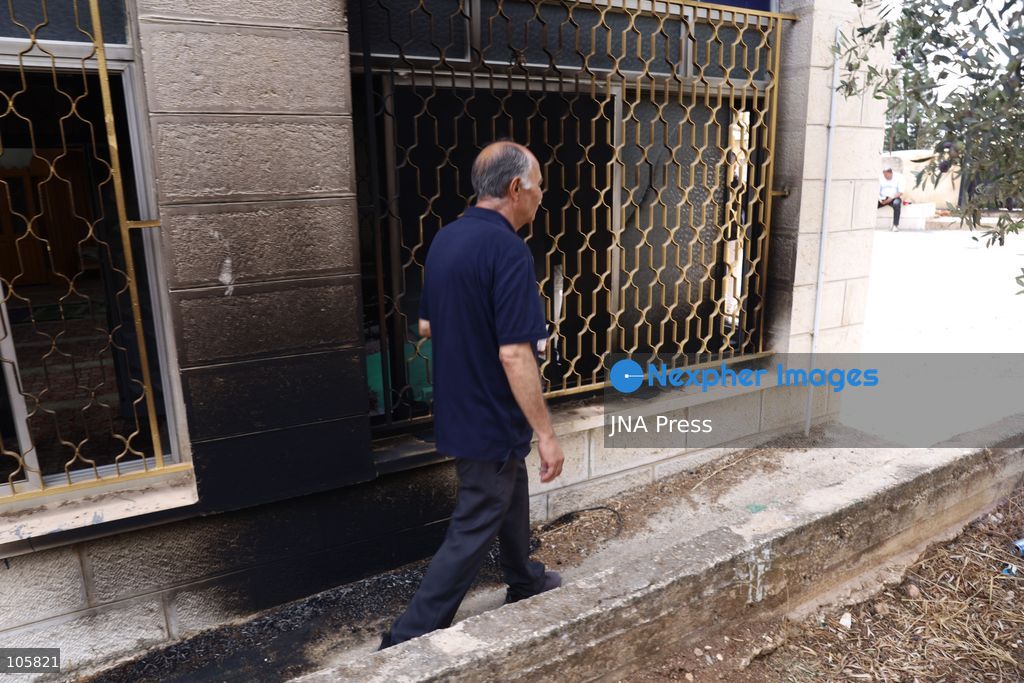MUKHMAS, WEST BANK, PALESTINE, OCTOBER 14, 2026: Damage at the Sultan Ibrahim Mosque following an overnight arson attack in Mukhmas, northeast of Jerusalem, in the occupied West Bank. Israeli settlers set fire to parts of the mosque, a car and olive trees and spray-painted racist and threatening slogans on the mosque’s walls, according to Palestinian officials and the mosque’s imam. Photo by Salman Mohsen Alkhatib / JNA Press. (Photo by Salman Mohsen Alkhatib/JNA Press via Nexpher Images)