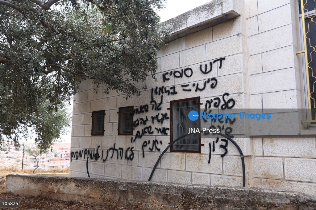 MUKHMAS, WEST BANK, PALESTINE, OCTOBER 14, 2026: Damage at the Sultan Ibrahim Mosque following an overnight arson attack in Mukhmas, northeast of Jerusalem, in the occupied West Bank. Israeli settlers set fire to parts of the mosque, a car and olive trees and spray-painted racist and threatening slogans on the mosque’s walls, according to Palestinian officials and the mosque’s imam. Photo by Salman Mohsen Alkhatib / JNA Press. (Photo by Salman Mohsen Alkhatib/JNA Press via Nexpher Images)