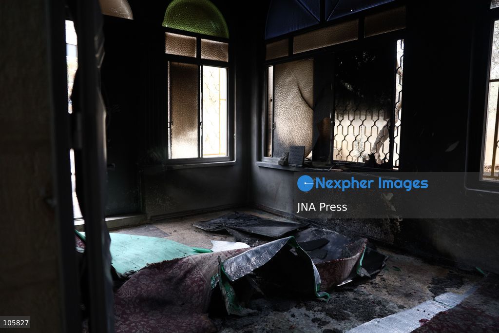 MUKHMAS, WEST BANK, PALESTINE, OCTOBER 14, 2026: Damage at the Sultan Ibrahim Mosque following an overnight arson attack in Mukhmas, northeast of Jerusalem, in the occupied West Bank. Israeli settlers set fire to parts of the mosque, a car and olive trees and spray-painted racist and threatening slogans on the mosque’s walls, according to Palestinian officials and the mosque’s imam. Photo by Salman Mohsen Alkhatib / JNA Press. (Photo by Salman Mohsen Alkhatib/JNA Press via Nexpher Images)