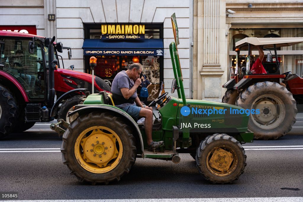 BARCELONA, SPAIN, OCTOBER 14, 2026: Catalan farmers drive tractors through central Barcelona during a demonstration demanding structural reforms and urgent financial support for the agricultural sector. Protesters call for measures to address rising fuel and production costs, drought and what they describe as insufficient government support. Photo by Marc Asensio Clupés / JNA Press. (Photo by Marc Asensio Clupes/JNA Press via Nexpher Images)