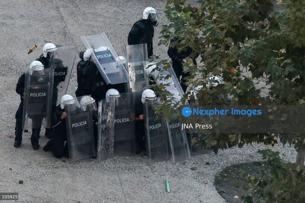 TIRANA, ALBANIA, OCTOBER 14, 2026: Demonstrators clash with riot police during student-led protests over rising education costs, university conditions and alleged corruption in Tirana. Fires damage the Ministry of Education and bank premises as protesters throw stones and other objects, while police use tear gas and water cannons. Photo by Vlasov Sulaj / JNA Press. (Photo by Vlasov Sulaj/JNA Press via Nexpher Images)