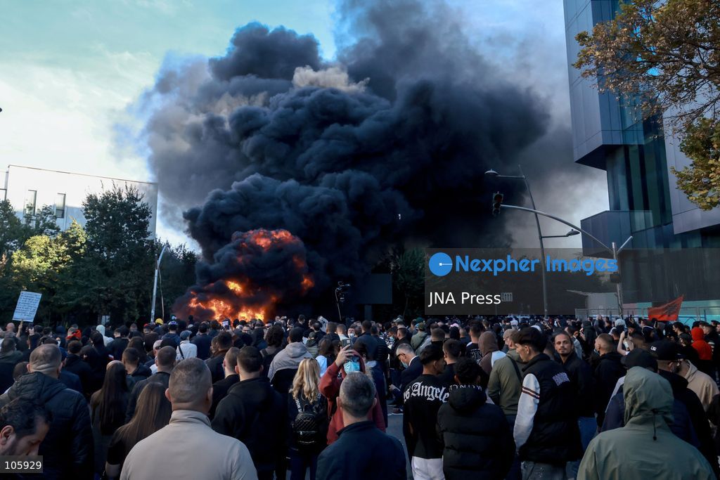 TIRANA, ALBANIA, OCTOBER 14, 2026: Demonstrators clash with riot police during student-led protests over rising education costs, university conditions and alleged corruption in Tirana. Fires damage the Ministry of Education and bank premises as protesters throw stones and other objects, while police use tear gas and water cannons. Photo by Vlasov Sulaj / JNA Press. (Photo by Vlasov Sulaj/JNA Press via Nexpher Images)