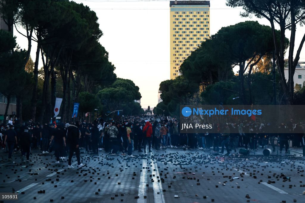 TIRANA, ALBANIA, OCTOBER 14, 2026: Demonstrators clash with riot police during student-led protests over rising education costs, university conditions and alleged corruption in Tirana. Fires damage the Ministry of Education and bank premises as protesters throw stones and other objects, while police use tear gas and water cannons. Photo by Vlasov Sulaj / JNA Press. (Photo by Vlasov Sulaj/JNA Press via Nexpher Images)