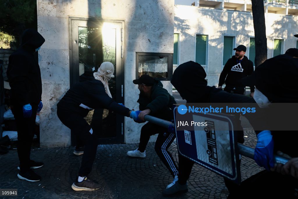 TIRANA, ALBANIA, OCTOBER 14, 2026: Demonstrators clash with riot police during student-led protests over rising education costs, university conditions and alleged corruption in Tirana. Fires damage the Ministry of Education and bank premises as protesters throw stones and other objects, while police use tear gas and water cannons. Photo by Vlasov Sulaj / JNA Press. (Photo by Vlasov Sulaj/JNA Press via Nexpher Images)