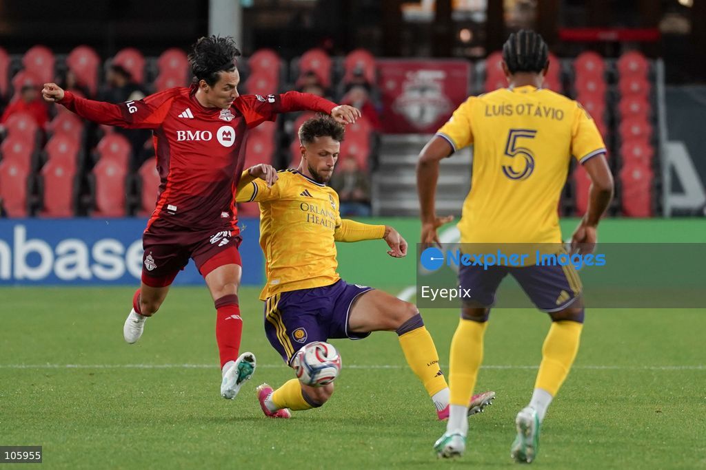 Daniel Salloi #20 of Toronto FC and David Brekalo #04 of Orlando City SC battle for the ball during the Major League Soccer Match between Toronto FC and Orlando City SC at BMO Field Stadium. on October 14, 2026 in Toronto, Canada. (Photo by Leonardo Ramirez/ Eyepix Group) (Photo by Leonardo Ramirez / Eyepix Group/Eyepix via Nexpher Images)