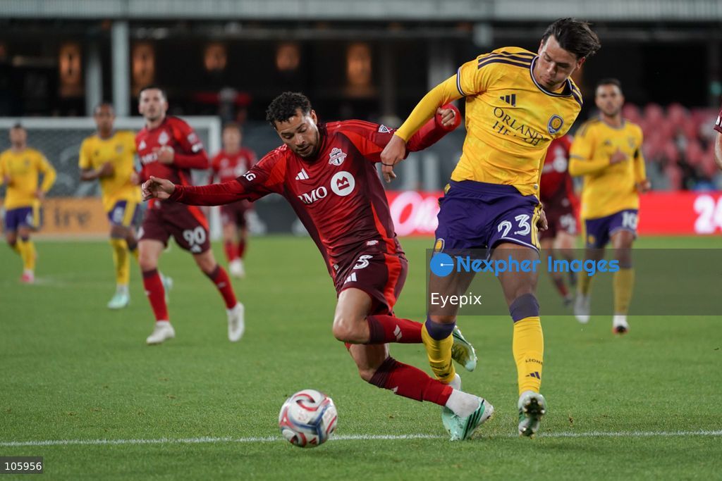 Matheus Pereira #03 of Toronto FC and Harvey Sarajian #23 of Orlando City SC battle for the ball during the Major League Soccer Match between Toronto FC and Orlando City SC at BMO Field Stadium. on October 14, 2026 in Toronto, Canada. (Photo by Leonardo Ramirez/ Eyepix Group) (Photo by Leonardo Ramirez / Eyepix Group/Eyepix via Nexpher Images)