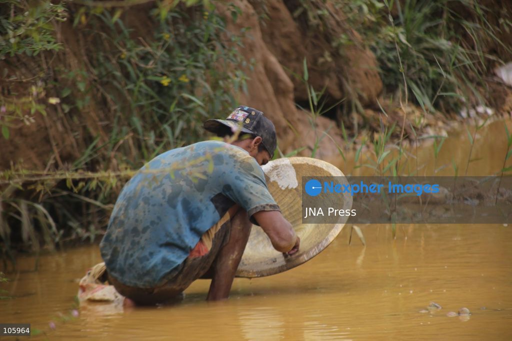 LAS CLARITAS, VENEZUELA, OCTOBER 15, 2026: Informal miners pan for gold in muddy water in Las Claritas, in Venezuela’s Orinoco Mining Arc. The photographs document working conditions and livelihoods in small-scale gold mining. Photo by Moisés Quintero / JNA Press. (Photo by Moisés Quintero/JNA Press via Nexpher Images)