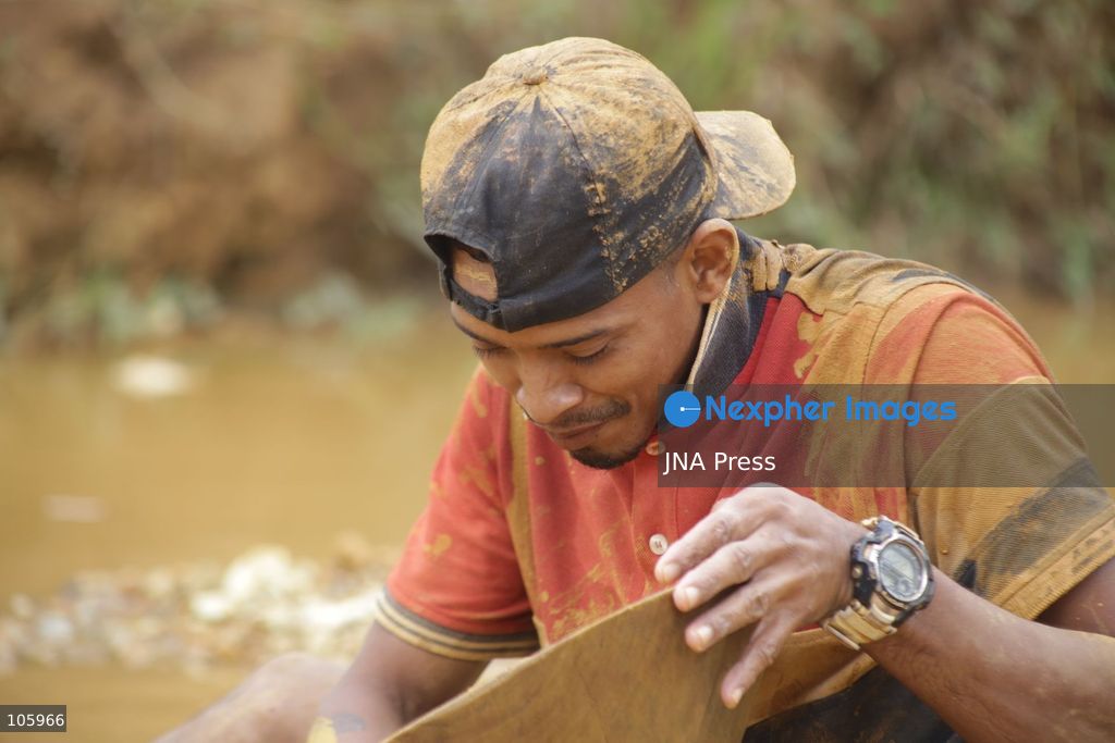 LAS CLARITAS, VENEZUELA, OCTOBER 15, 2026: Informal miners pan for gold in muddy water in Las Claritas, in Venezuela’s Orinoco Mining Arc. The photographs document working conditions and livelihoods in small-scale gold mining. Photo by Moisés Quintero / JNA Press. (Photo by Moisés Quintero/JNA Press via Nexpher Images)