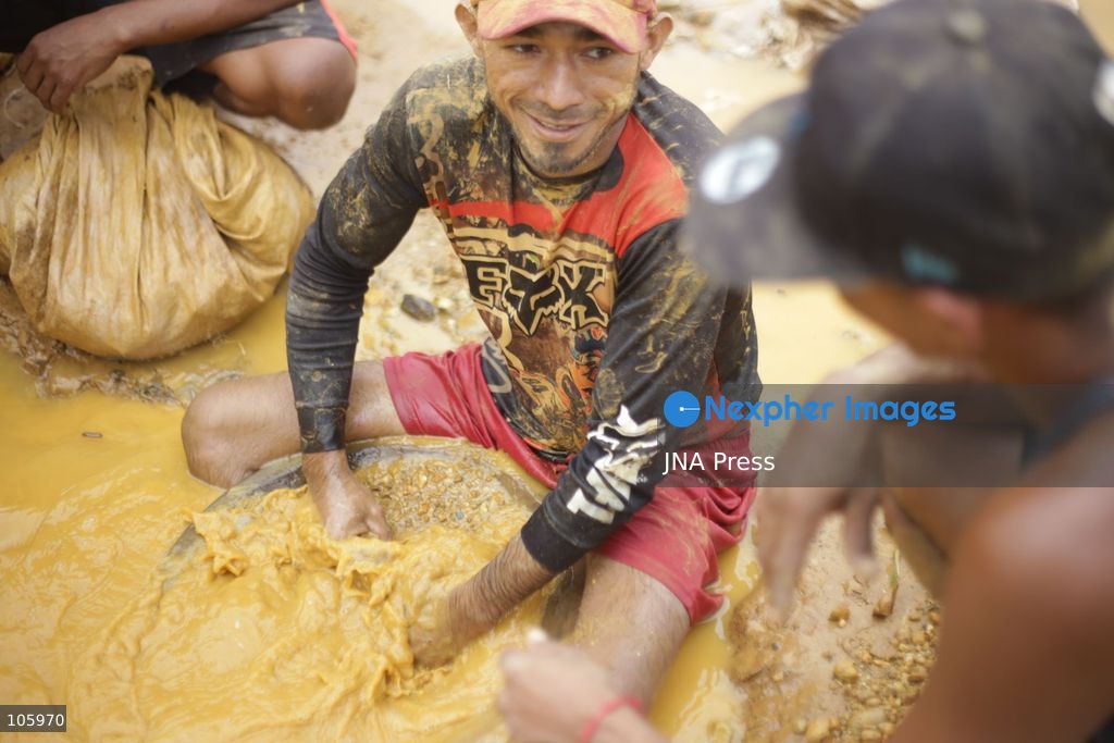 LAS CLARITAS, VENEZUELA, OCTOBER 15, 2026: Informal miners pan for gold in muddy water in Las Claritas, in Venezuela’s Orinoco Mining Arc. The photographs document working conditions and livelihoods in small-scale gold mining. Photo by Moisés Quintero / JNA Press. (Photo by Moisés Quintero/JNA Press via Nexpher Images)