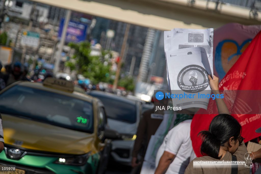 BANGKOK, THAILAND, OCTOBER 15, 2026: Civil society activists march in Bangkok to protest against the World Bank and the International Monetary Fund during their 2026 Annual Meetings. Demonstrators carry banners and signs opposing the institutions as organisers seek police permission to demonstrate outside the Queen Sirikit National Convention Center. Photo by Panawat Seangsotg / JNA Press. (Photo by Panawat Seangsotg/JNA Press via Nexpher Images)