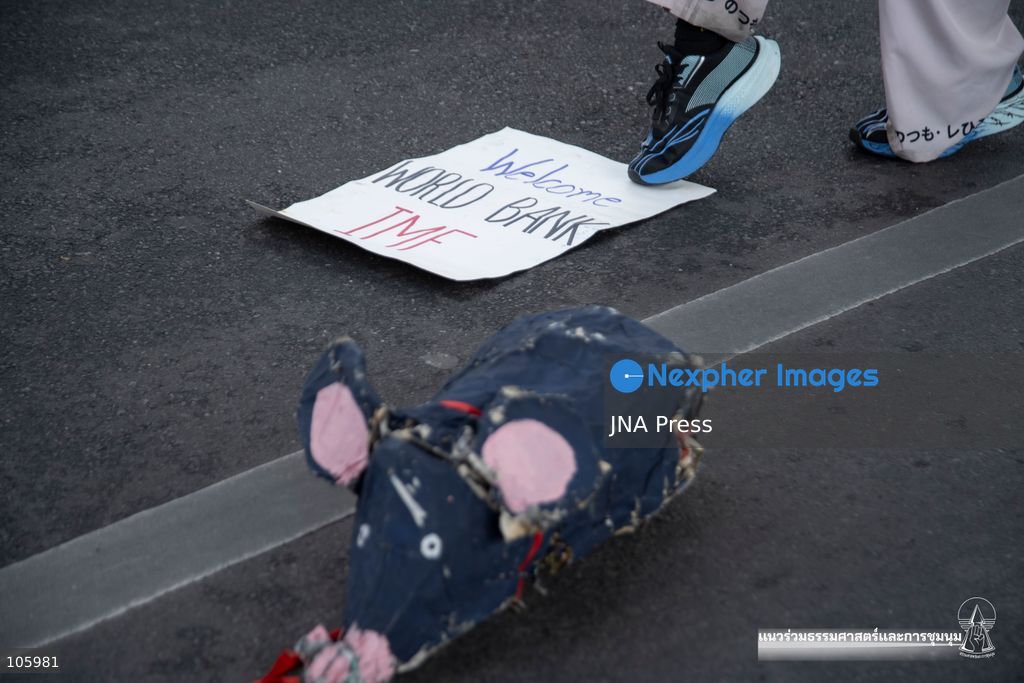 BANGKOK, THAILAND, OCTOBER 15, 2026: Civil society activists march in Bangkok to protest against the World Bank and the International Monetary Fund during their 2026 Annual Meetings. Demonstrators carry banners and signs opposing the institutions as organisers seek police permission to demonstrate outside the Queen Sirikit National Convention Center. Photo by Panawat Seangsotg / JNA Press. (Photo by Panawat Seangsotg/JNA Press via Nexpher Images)
