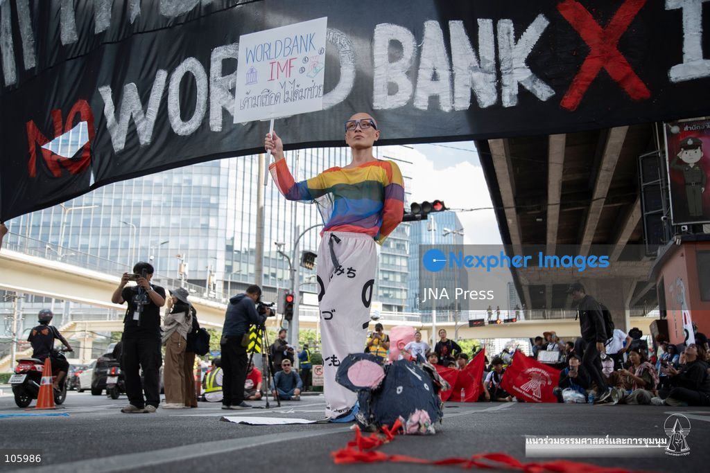 BANGKOK, THAILAND, OCTOBER 15, 2026: Civil society activists march in Bangkok to protest against the World Bank and the International Monetary Fund during their 2026 Annual Meetings. Demonstrators carry banners and signs opposing the institutions as organisers seek police permission to demonstrate outside the Queen Sirikit National Convention Center. Photo by Panawat Seangsotg / JNA Press. (Photo by Panawat Seangsotg/JNA Press via Nexpher Images)