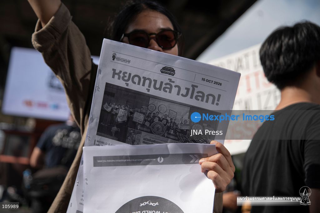 BANGKOK, THAILAND, OCTOBER 15, 2026: Civil society activists march in Bangkok to protest against the World Bank and the International Monetary Fund during their 2026 Annual Meetings. Demonstrators carry banners and signs opposing the institutions as organisers seek police permission to demonstrate outside the Queen Sirikit National Convention Center. Photo by Panawat Seangsotg / JNA Press. (Photo by Panawat Seangsotg/JNA Press via Nexpher Images)
