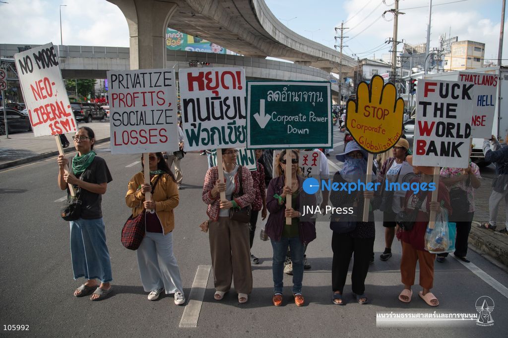 BANGKOK, THAILAND, OCTOBER 15, 2026: Civil society activists march in Bangkok to protest against the World Bank and the International Monetary Fund during their 2026 Annual Meetings. Demonstrators carry banners and signs opposing the institutions as organisers seek police permission to demonstrate outside the Queen Sirikit National Convention Center. Photo by Panawat Seangsotg / JNA Press. (Photo by Panawat Seangsotg/JNA Press via Nexpher Images)