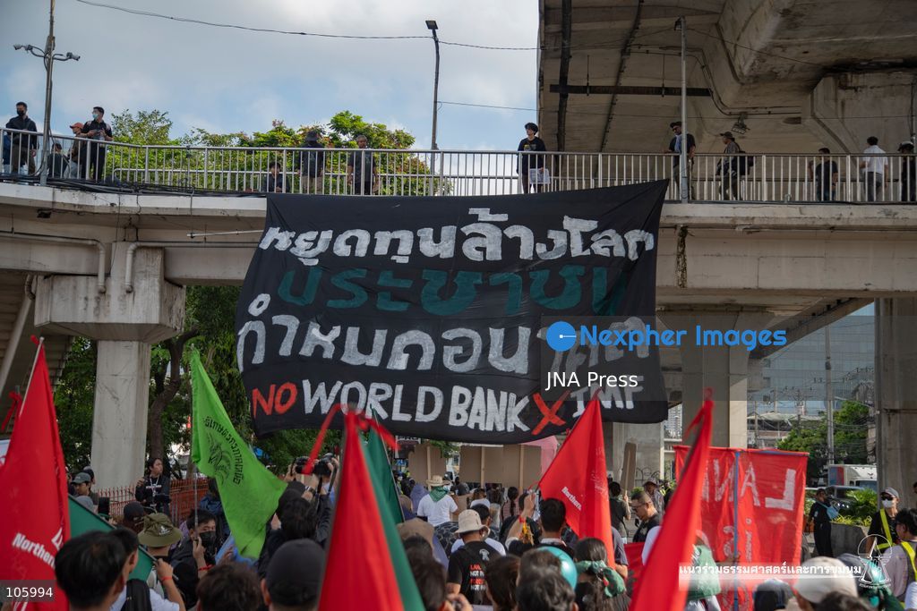 BANGKOK, THAILAND, OCTOBER 15, 2026: Civil society activists march in Bangkok to protest against the World Bank and the International Monetary Fund during their 2026 Annual Meetings. Demonstrators carry banners and signs opposing the institutions as organisers seek police permission to demonstrate outside the Queen Sirikit National Convention Center. Photo by Panawat Seangsotg / JNA Press. (Photo by Panawat Seangsotg/JNA Press via Nexpher Images)