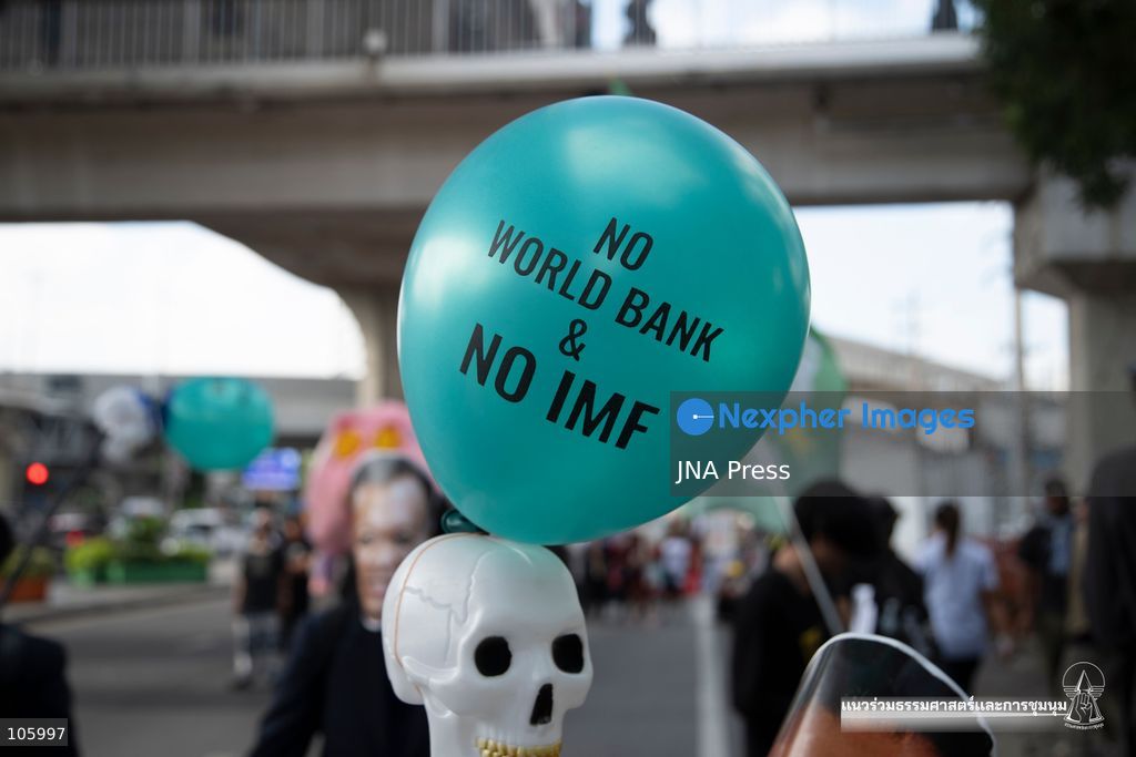 BANGKOK, THAILAND, OCTOBER 15, 2026: Civil society activists march in Bangkok to protest against the World Bank and the International Monetary Fund during their 2026 Annual Meetings. Demonstrators carry banners and signs opposing the institutions as organisers seek police permission to demonstrate outside the Queen Sirikit National Convention Center. Photo by Panawat Seangsotg / JNA Press. (Photo by Panawat Seangsotg/JNA Press via Nexpher Images)