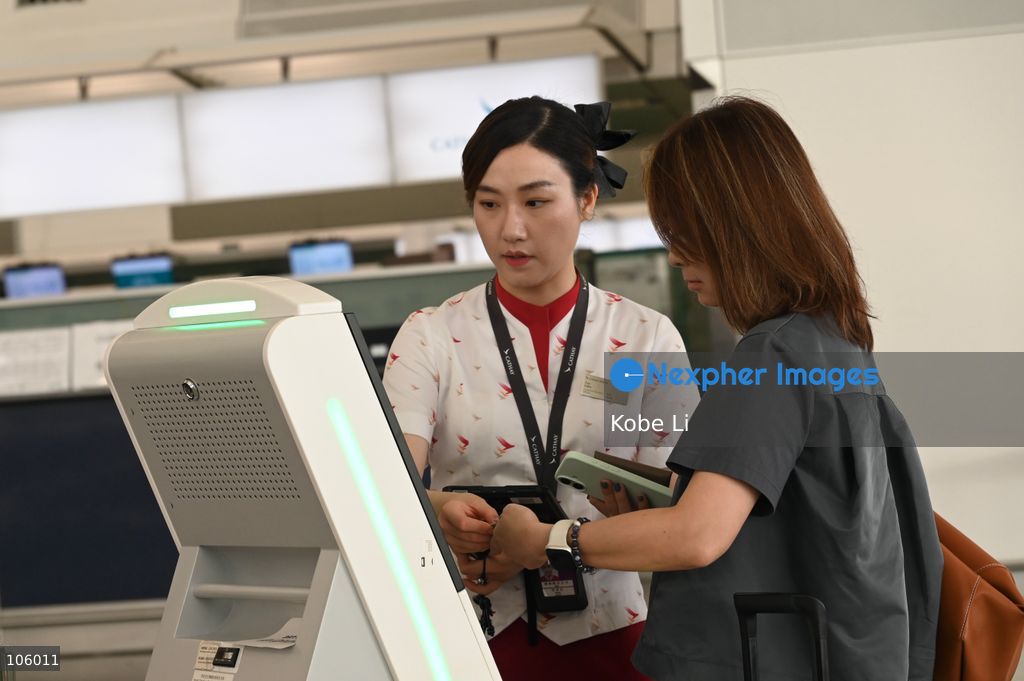 A Cathay Pacific Flight Attendant working at Hong Kong Information Airport on October 15, 2026 in Hong Kong.