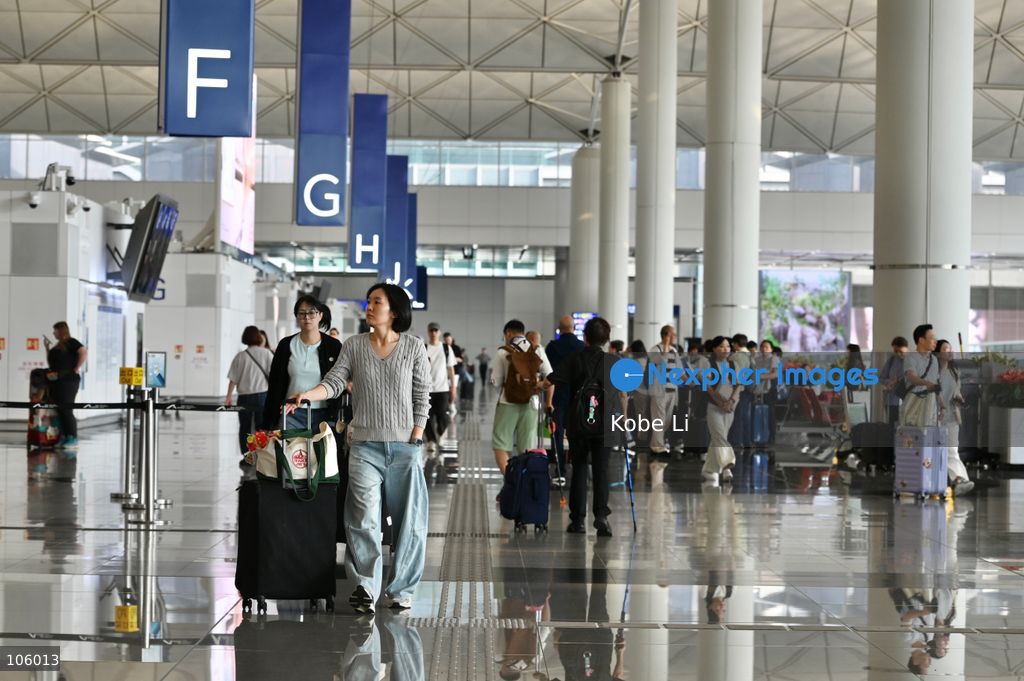 Visitors walking at Hong Kong Information Airport on October 15, 2026 in Hong Kong.