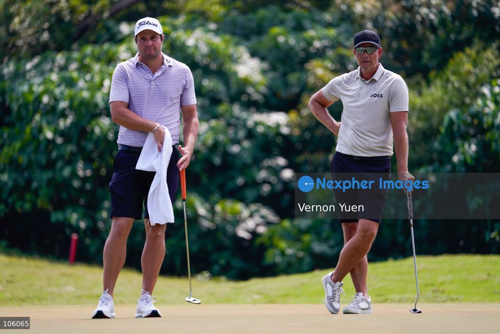 Swedish golfer Henrik Stenson and American golfer Peter Uihlein during the SJM Macau Open 2026 golf tournament at the Macau golf and country club on October 15, 2026 in Macau. (Photo by Vernon Yuen/Nexpher Images)