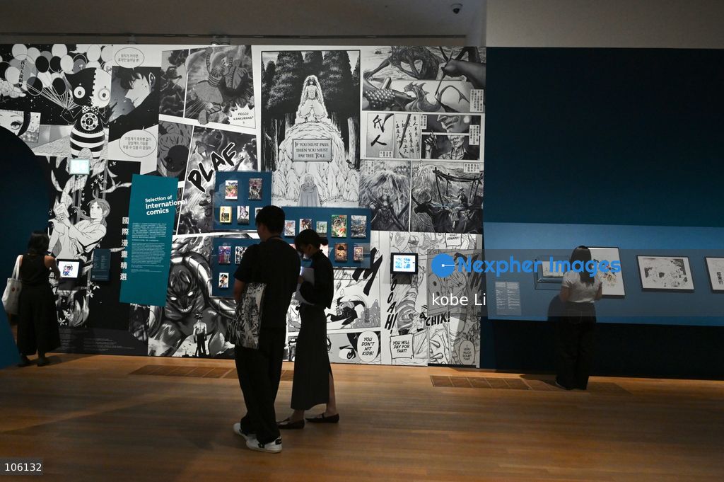 Visitors watching exhibits, the "Myths and Monsters: The Art of Fantasy in Asia" exhibition opening at Hong Kong’s M+. on October 15, 2026 in Hong Kong.