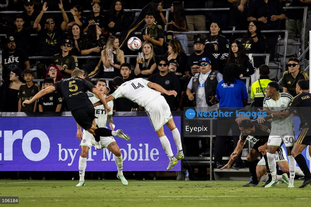 Ryan Porteous #5 of Los Angeles FC and Brendan Hines-Ike of Austin FC battle for the header during the matchday 30 of Major League Soccer between Los Angeles Football Club and Austin FC at BMO Stadium on October 14, 2026 in Los Angeles, California. (Photo by Arturo Cordero / Eyepix Group) (Photo by Arturo Cordero / Eyepix Group/Eyepix via Nexpher Images)