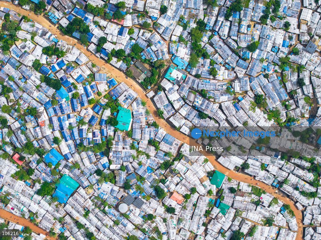 UKHIYA, COX’S BAZAR, BANGLADESH — OCTOBER 14, 2026: Aerial views show densely packed shelters and winding pathways across the Kutupalong Rohingya refugee camp in Ukhiya, Cox’s Bazar, Bangladesh. The photographs document the extensive settlement, where thousands of shelters are clustered across a hilly landscape interspersed with vegetation and access roads. (Photo by Istiyak Ahamed Srabon/JNA Press via Nexpher Images)