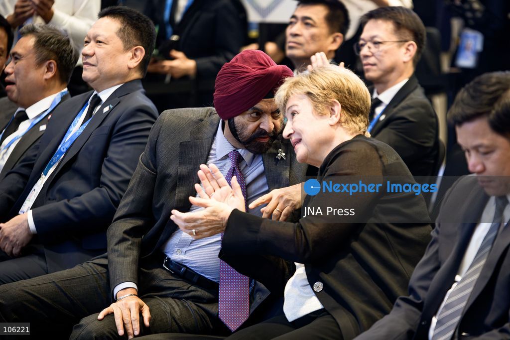 BANGKOK, THAILAND - OCTOBER 15, 2026: World Bank Group President Ajay Banga (L) interacts with International Monetary Fund Managing Director Kristalina Georgieva (R) during a THAI FIGHT showcase at the Queen Sirikit National Convention Center (QSNCC) in Bangkok, as part of the 2026 Annual Meetings of the International Monetary Fund (IMF) and the World Bank Group. The event features traditional Thai martial arts as part of a cultural showcase aimed at promoting Thailand’s cultural heritage to an international audience. Photo by Watsawat Koktabtim / JNA Press. (Photo by Watsawat "James" Koktabtim/JNA Press via Nexpher Images)