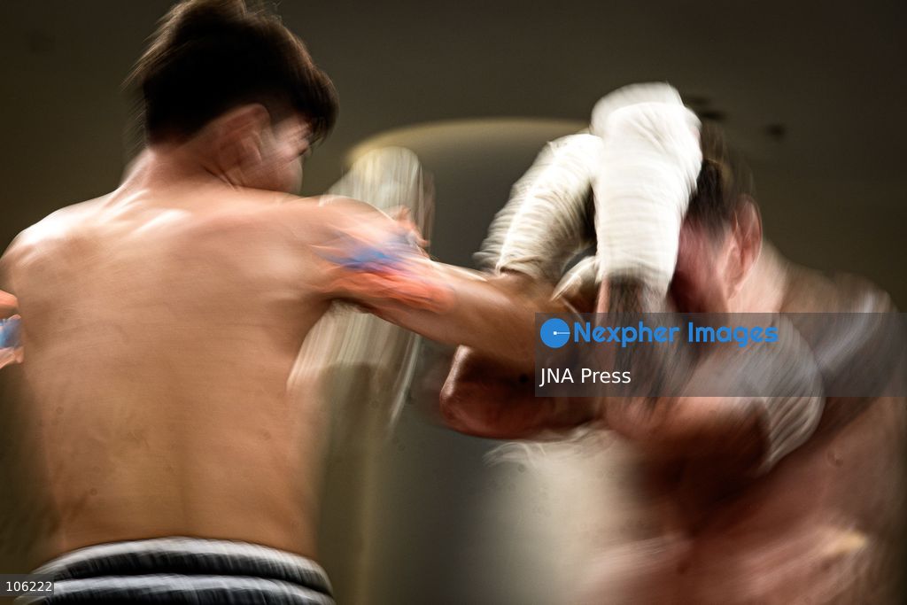 BANGKOK, THAILAND - OCTOBER 15, 2026: (SHUTTER DRAG IMAGE) Muay Thai fighters compete in live boxing bouts during a THAI FIGHT showcase at the Queen Sirikit National Convention Center (QSNCC) in Bangkok, as part of the 2026 Annual Meetings of the International Monetary Fund (IMF) and the World Bank Group. The event features traditional Thai martial arts as part of a cultural showcase aimed at promoting Thailand’s cultural heritage to an international audience. Photo by Watsawat Koktabtim / JNA Press. (Photo by Watsawat "James" Koktabtim/JNA Press via Nexpher Images)