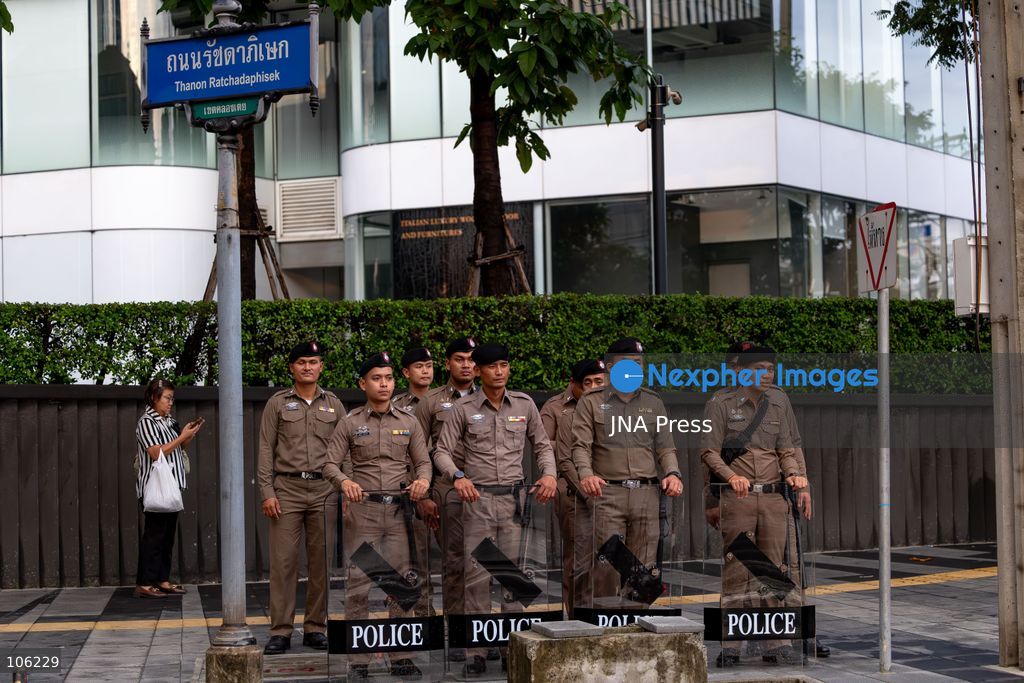BANGKOK, THAILAND, OCTOBER 15, 2026: Members of the People’s Network Against the World Bank and IMF demonstrate at Rama IV intersection during the annual meetings of the International Monetary Fund and the World Bank Group at the Queen Sirikit National Convention Center. Demonstrators raise concerns over economic inequality, debt and the environmental impact of development policies. Protesters remain at the site during heavy rain as police maintain security around the gathering. Photo by Thanatchanont Jiraworathanakul / JNA Press (Photo by Thanatchanont Jiraworathanakul/JNA Press via Nexpher Images)
