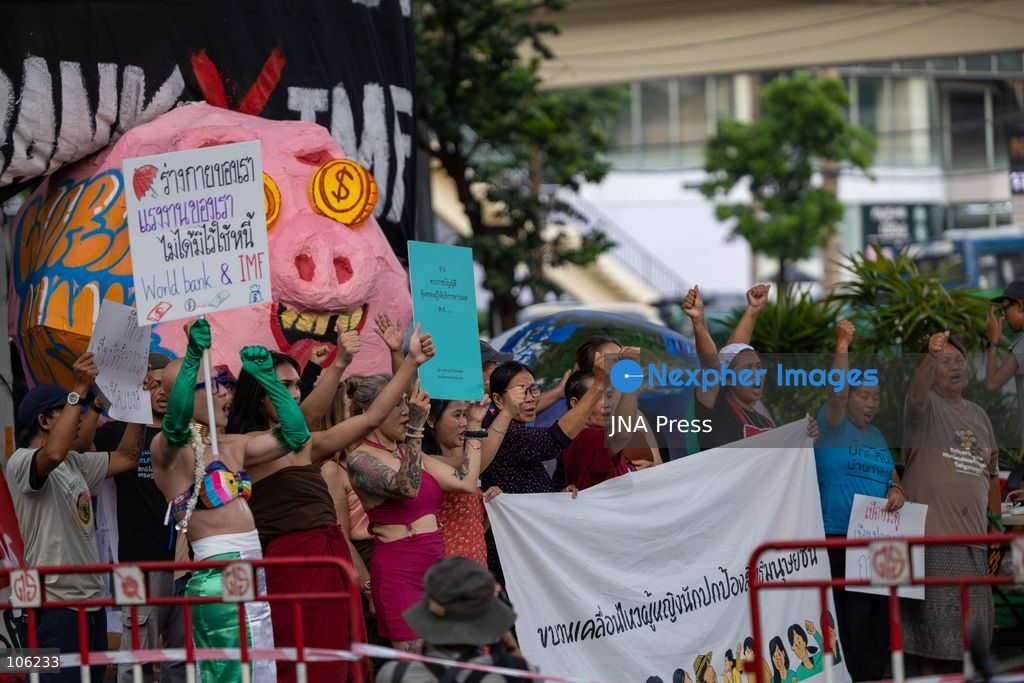 BANGKOK, THAILAND, OCTOBER 15, 2026: Members of the People’s Network Against the World Bank and IMF demonstrate at Rama IV intersection during the annual meetings of the International Monetary Fund and the World Bank Group at the Queen Sirikit National Convention Center. Demonstrators raise concerns over economic inequality, debt and the environmental impact of development policies. Protesters remain at the site during heavy rain as police maintain security around the gathering. Photo by Thanatchanont Jiraworathanakul / JNA Press (Photo by Thanatchanont Jiraworathanakul/JNA Press via Nexpher Images)