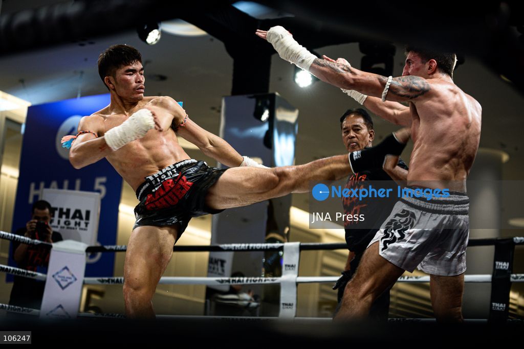BANGKOK, THAILAND - OCTOBER 15, 2026: Muay Thai fighters compete in live boxing bouts during a THAI FIGHT showcase at the Queen Sirikit National Convention Center (QSNCC) in Bangkok, as part of the 2026 Annual Meetings of the International Monetary Fund (IMF) and the World Bank Group. The event features traditional Thai martial arts as part of a cultural showcase aimed at promoting Thailand’s cultural heritage to an international audience. Photo by Watsawat Koktabtim / JNA Press. (Photo by Watsawat "James" Koktabtim/JNA Press via Nexpher Images)
