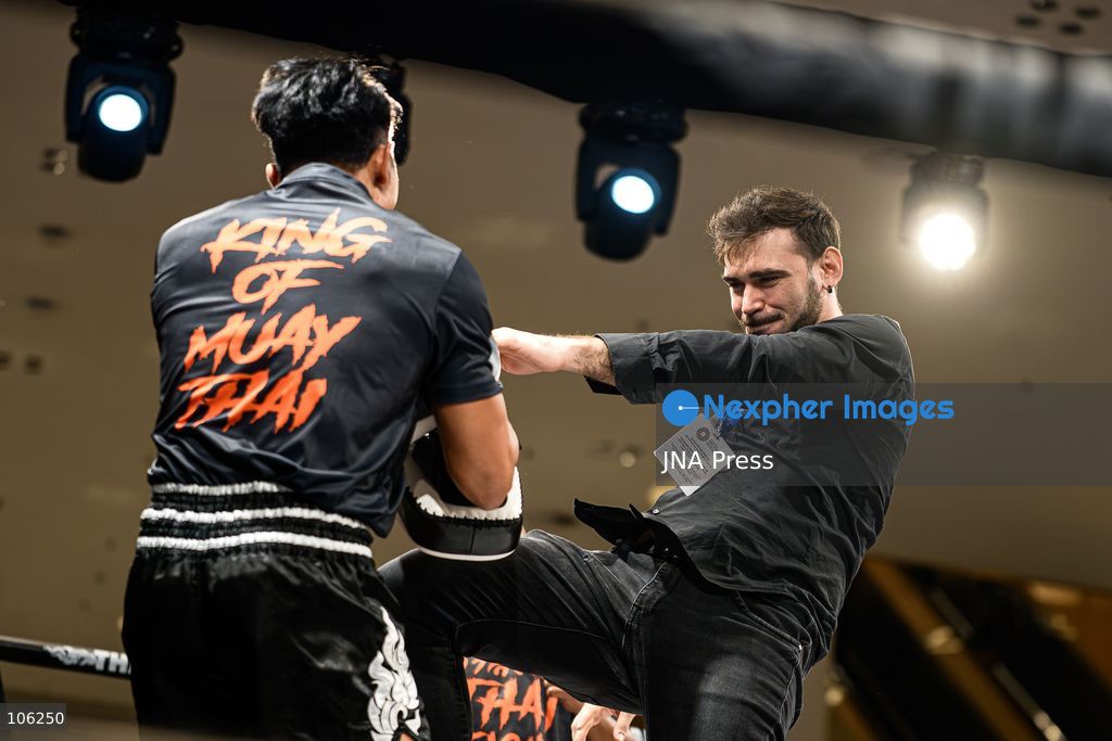 BANGKOK, THAILAND - OCTOBER 15, 2026: Participants practice "Muay Thai" on the stage during a THAI FIGHT showcase at the Queen Sirikit National Convention Center (QSNCC) in Bangkok, as part of the 2026 Annual Meetings of the International Monetary Fund (IMF) and the World Bank Group. The event features traditional Thai martial arts as part of a cultural showcase aimed at promoting Thailand’s cultural heritage to an international audience. Photo by Watsawat Koktabtim / JNA Press. (Photo by Watsawat "James" Koktabtim/JNA Press via Nexpher Images)