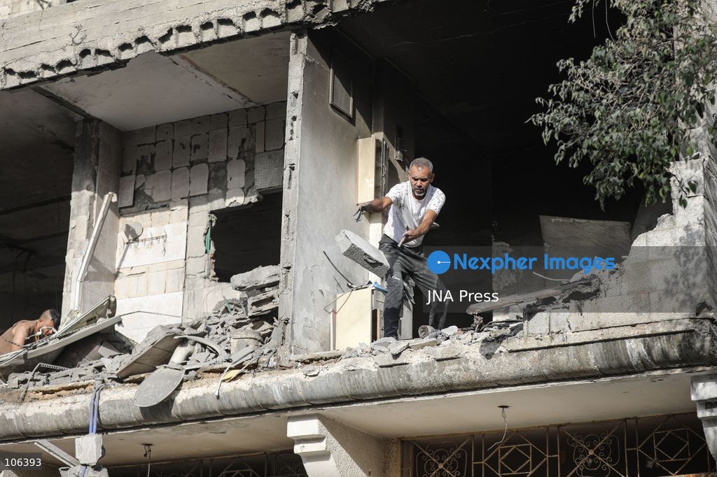 MAGHAZI REFUGEE CAMP, GAZA STRIP, PALESTINE, [MONTH DAY, YEAR]: Destruction following Israeli airstrikes that hit homes belonging to the Saada and Abu Muaileq families in Maghazi refugee camp in the central Gaza Strip. The strikes on October 15 destroyed both homes and caused extensive damage to surrounding residential buildings. Photo by Ramzi Abu AMER/ JNA Press. (Photo by Ramzi Abu Amer/JNA Press via Nexpher Images)