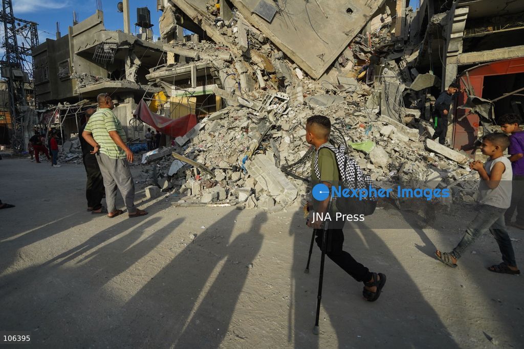 MAGHAZI REFUGEE CAMP, GAZA STRIP, PALESTINE, [MONTH DAY, YEAR]: Destruction following Israeli airstrikes that hit homes belonging to the Saada and Abu Muaileq families in Maghazi refugee camp in the central Gaza Strip. The strikes on October 15 destroyed both homes and caused extensive damage to surrounding residential buildings. Photo by Ramzi Abu AMER/ JNA Press. (Photo by Ramzi Abu Amer/JNA Press via Nexpher Images)