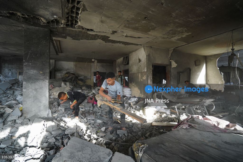 MAGHAZI REFUGEE CAMP, GAZA STRIP, PALESTINE, [MONTH DAY, YEAR]: Destruction following Israeli airstrikes that hit homes belonging to the Saada and Abu Muaileq families in Maghazi refugee camp in the central Gaza Strip. The strikes on October 15 destroyed both homes and caused extensive damage to surrounding residential buildings. Photo by Ramzi Abu AMER/ JNA Press. (Photo by Ramzi Abu Amer/JNA Press via Nexpher Images)