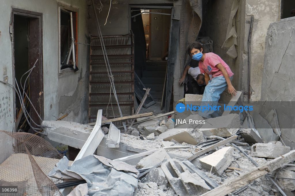 MAGHAZI REFUGEE CAMP, GAZA STRIP, PALESTINE, [MONTH DAY, YEAR]: Destruction following Israeli airstrikes that hit homes belonging to the Saada and Abu Muaileq families in Maghazi refugee camp in the central Gaza Strip. The strikes on October 15 destroyed both homes and caused extensive damage to surrounding residential buildings. Photo by Ramzi Abu AMER/ JNA Press. (Photo by Ramzi Abu Amer/JNA Press via Nexpher Images)
